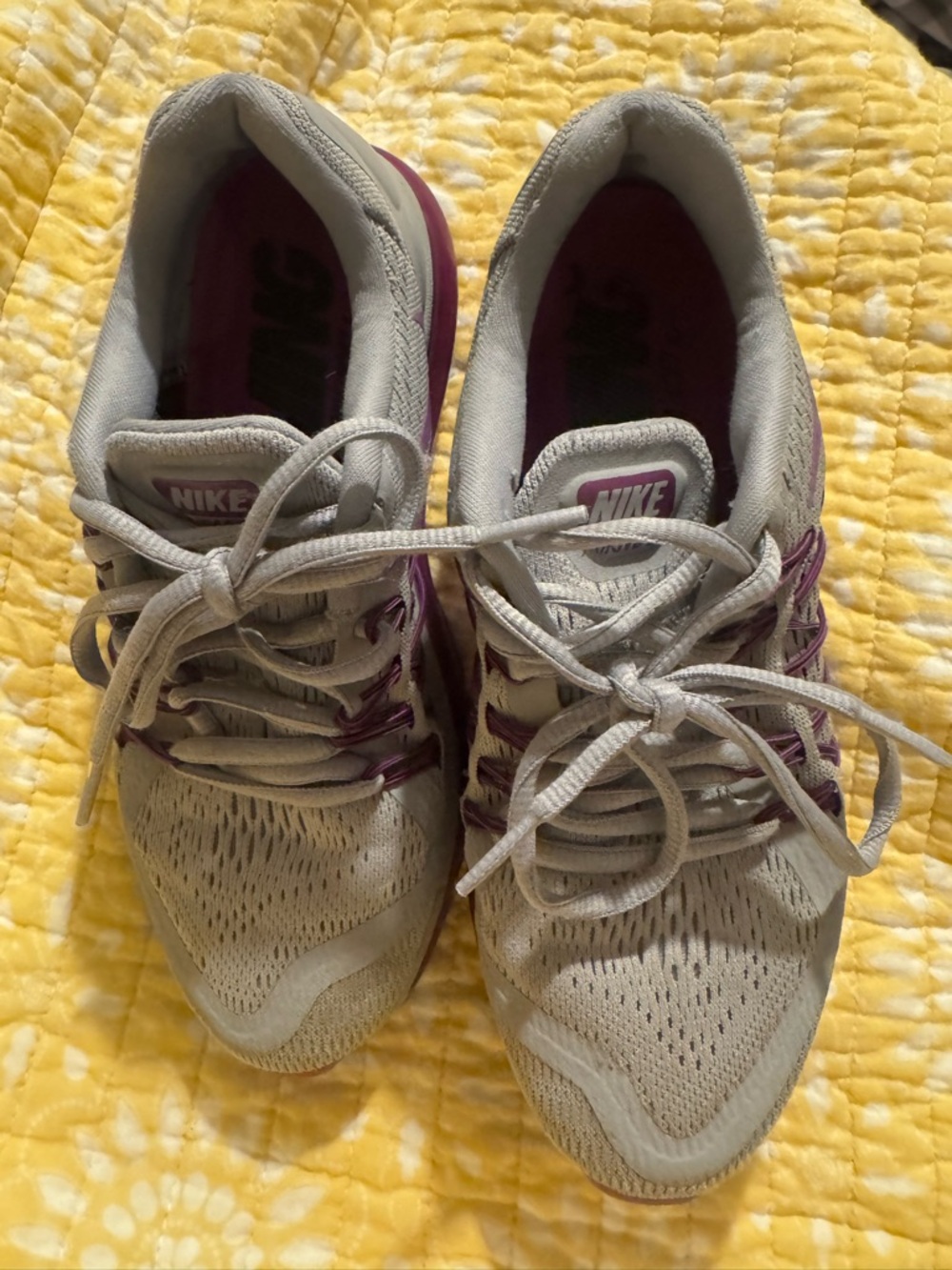 Nike Women's Light Gray Running Shoes with Purple Accents